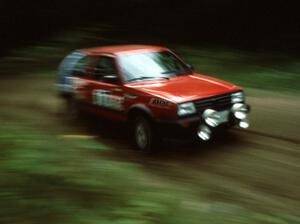 Cal Landau / Eric Marcus in their Dominos sponsored VW GTI rocket past.