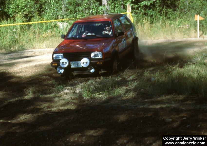 Cal Landau / Eric Marcus in their Dominos sponsored VW GTI hit the haipin perfectly.