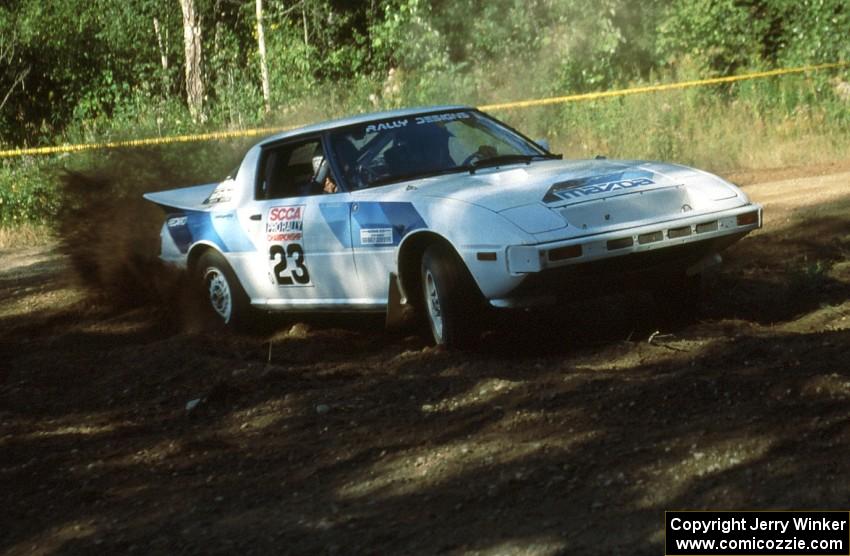 Carl Kieranen / Diane Sargent take the hairpin left uphill at the crossroads.