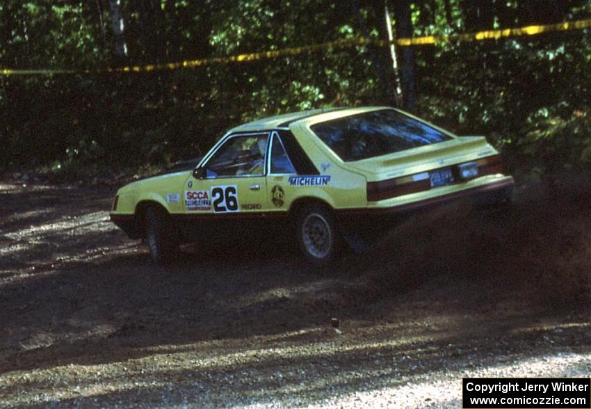 Don Rathgeber / Paul Bacina hit the throttle as they go uphill in their Ford Mustang.