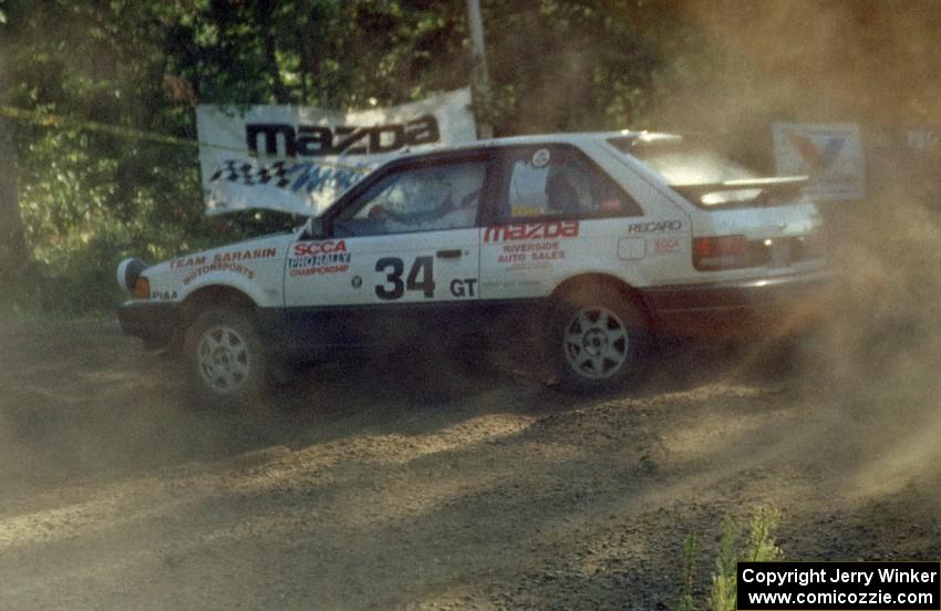 Staurt Sarasin / Joyce Sarasin decided to leave their one-year old son Kyle at home to rally in their PGT Mazda 323GTX.