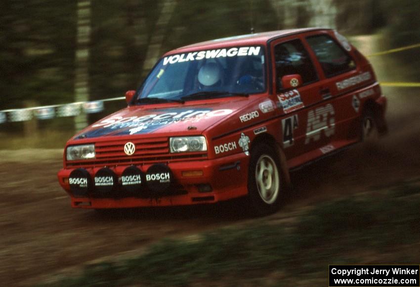 The very fast Jean-Paul Perusse / Martin Headland VW Golf Rallye blasts downhill in the Paul Bunyan State Forest.