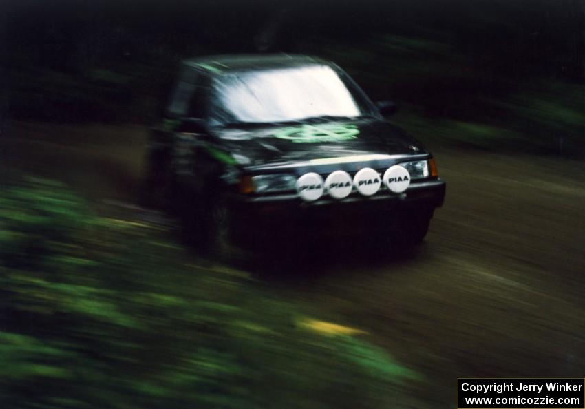 Tom Ottey / Pam McGarvey in their new PGT Mazda 323GTX.