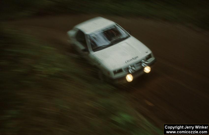 Henry Krolikowski / Cindy Krolikowski at a tight corner on Blue Trail in their Dodge Shadow.