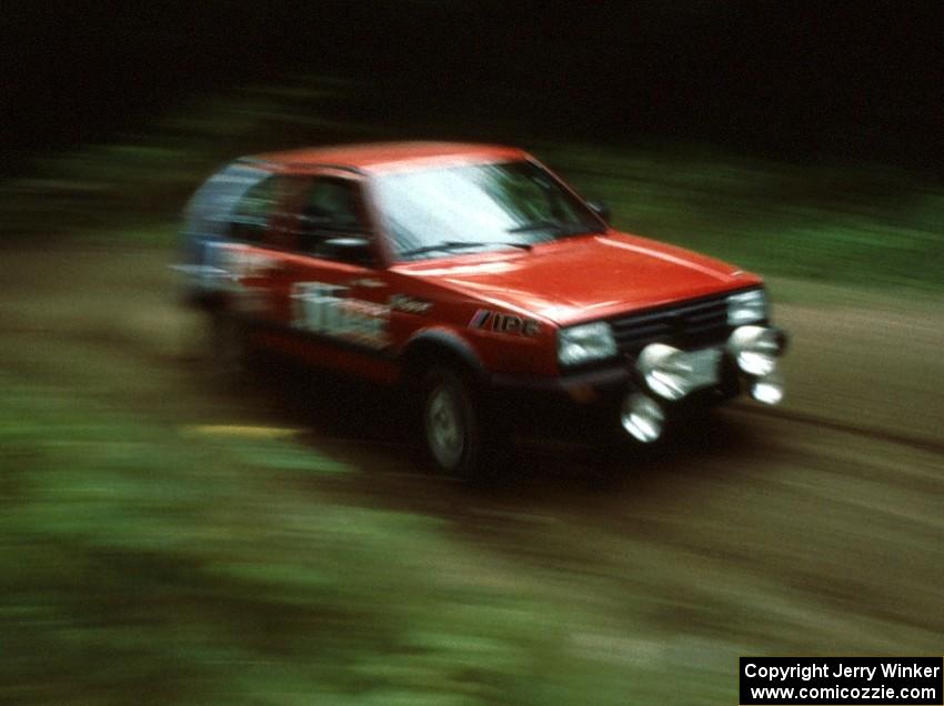 Cal Landau / Eric Marcus in their Dominos sponsored VW GTI rocket past.