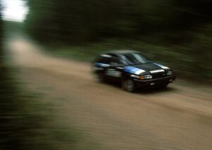 Jim Hughes / David Randall in their PGT Mazda 323GTX.