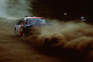 Chad DiMarco / Erick Hauge throw out swells of dust out the back of their Gr. A Subaru Legacy.