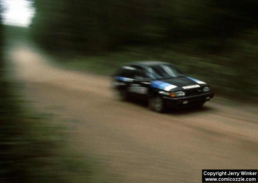 Jim Hughes / David Randall in their PGT Mazda 323GTX.