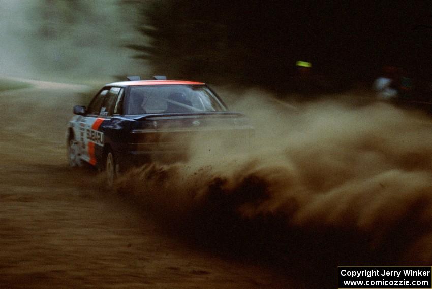 Chad DiMarco / Erick Hauge throw out swells of dust out the back of their Gr. A Subaru Legacy.