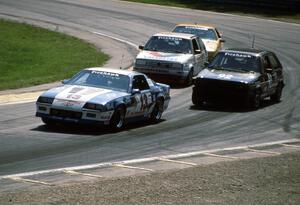 Four cars come through Canada Corner