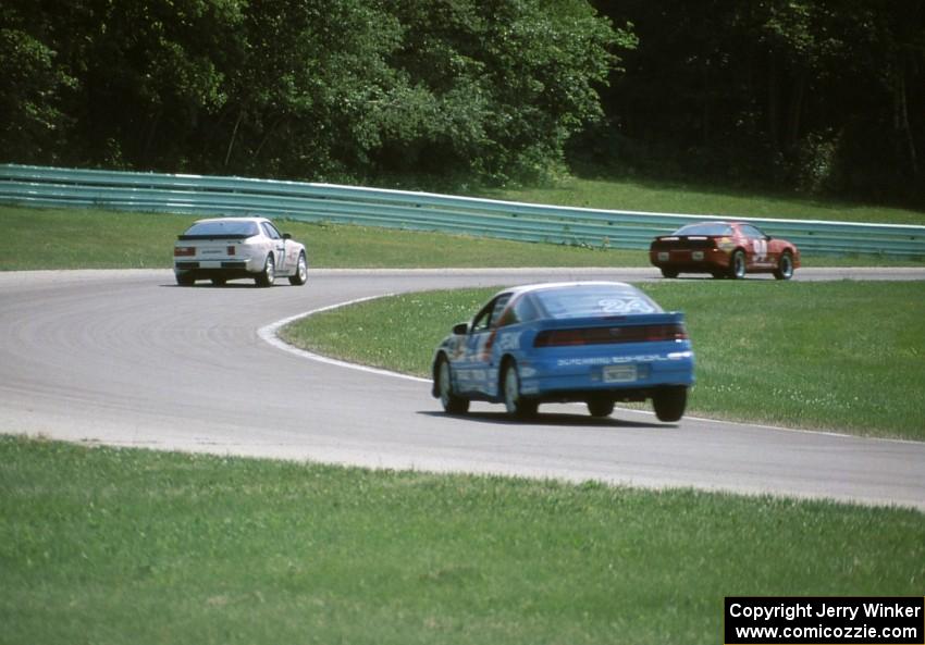 Three cars through the carousel