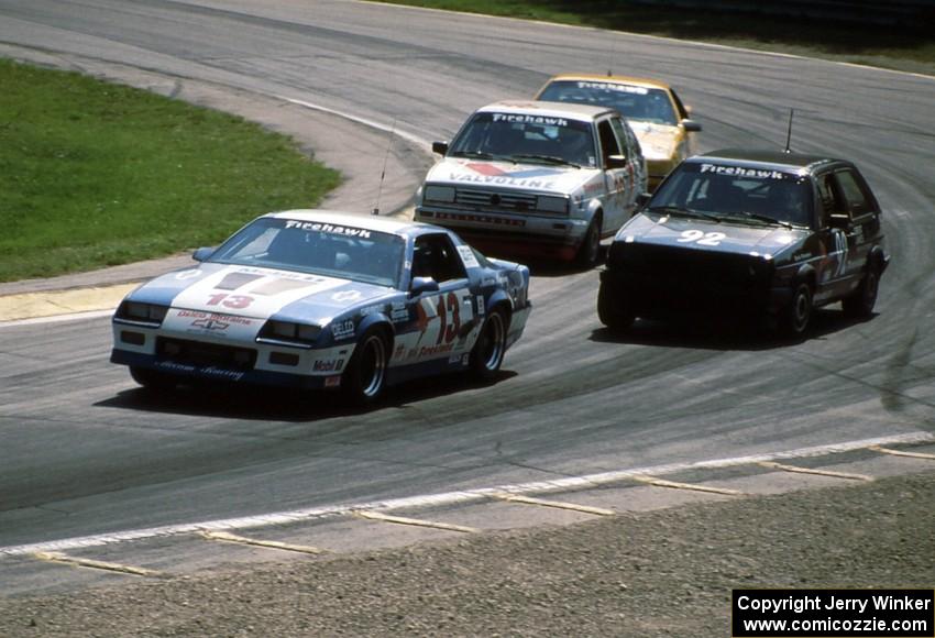 Four cars come through Canada Corner