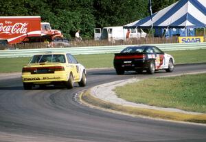 Mike Rutherford's Mitsubishi Eclipse and Dave Jolly's Mazda MX-6 GT Turbo