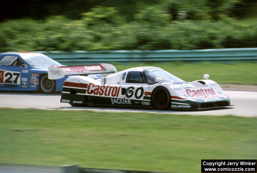 Jan Lammers / Price Cobb Jaguar XJR-10 passes the Lance Stewart / John Overton Mazda RX-7 (GTU)