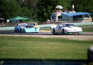 Five cars go through turn 8