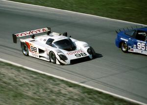 Juan-Manuel Fangio II / Drake Olson Toyota 88C passes the Bob Leitzinger / Chuck Kurtz Nissan 240SX (GTU)