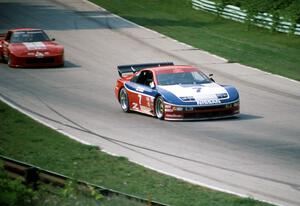 Steve Millen's Nissan 300ZX Turbo (GTO) and Dick Greer / Mike Mees Mazda RX-7 (GTU)