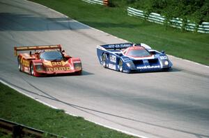 Geoff Brabham / Chip Robinson Nissan GTP ZX-T passes the Gianpiero Moretti / Jean-Louis Ricci Porsche 962C