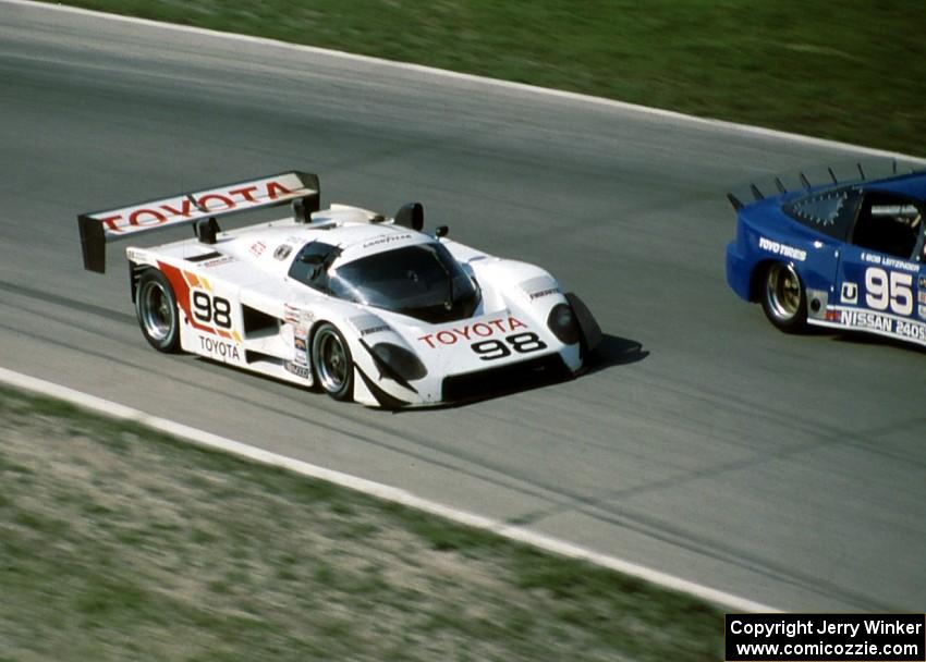 Juan-Manuel Fangio II / Drake Olson Toyota 88C passes the Bob Leitzinger / Chuck Kurtz Nissan 240SX (GTU)