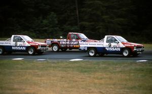 9) Scott Gaylord's Nissan Pickup, 33) Tommy Archer's Jeep Comanche, 8) Ray Kong's Nissan Pickup