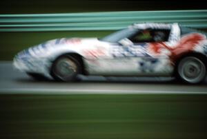 Scott Lagasse's Chevy Corvette brakes hard into turn one at sundown.