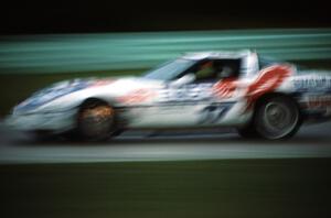 Scott Lagasse's Chevy Corvette brakes hard into turn one at sundown.