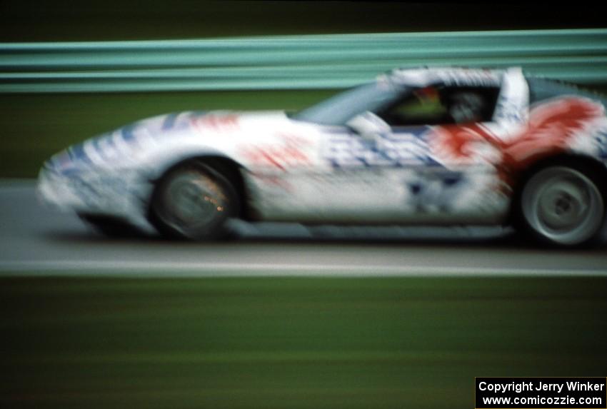 Scott Lagasse's Chevy Corvette brakes hard into turn one at sundown.