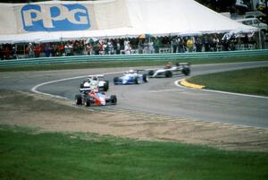 Robbie Groff, Mark Smith, Harald Huysman and Jeff Davis all in Ralt RT-5s, on lap one.