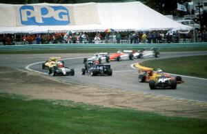 Cars spinning at turn 5 in the rain.