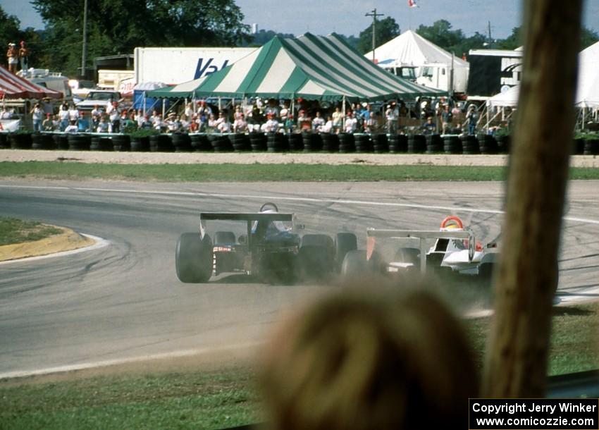 Claude Bourbonnais' Swift DB-4 gets the inside line on Jacques Villeneuve's Swift DB-4