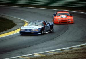 Ron Fellows' Ford Mustang holds off Max Jones' Chevy Beretta