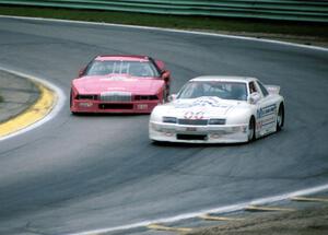 A.B. Coleman's Chevy Beretta keeps ahead of Craig Bennett's Buick Regal