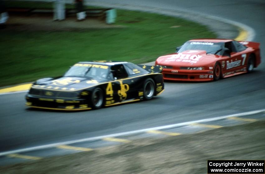 Robert Lappalainen's Ford Mustang and Paul Gentilozzi's Olds Cutlass Supreme