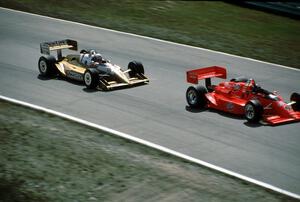 Danny Sullivan's Penske PC-18/Chevy prepares to pass Didier Theys' Lola T-88/00/Buick