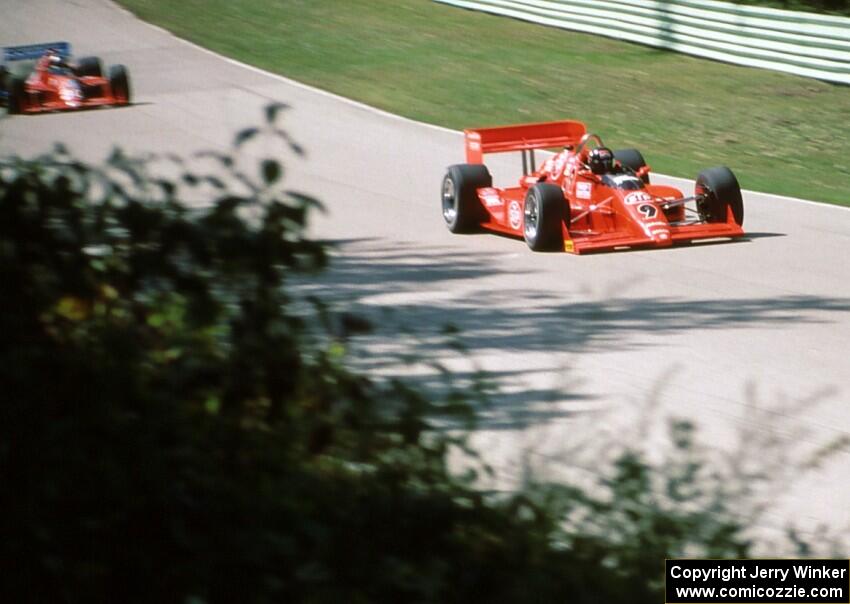 Didier Theys' Lola T-88/00/Buick ahead of Raul Boesel's Lola T-89/00/Judd