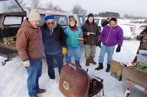 ???, Bill Nelson, Julie and John Kochevar and Dick Nordby grill before Sunday's Enduro