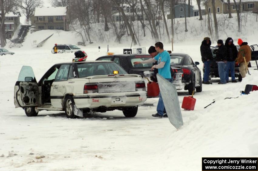 Kyle Laursen / Preston Jordan / Dan Drury Subaru Legacy in the pits between races