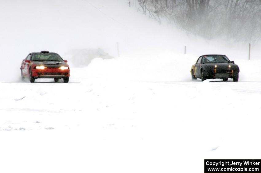 L) Chris Mogren / Jake Weber Mitsubishi Eclipse and R) Don Hupe / Daniel Roberts Mazda RX-7