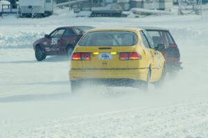 Wendy Burhans / Dan Burhans II SAAB 900 trails the Randy Christman / Jim Deline VW Rabbit