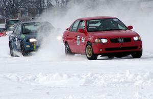 Pete Tavernier / Bruce Powell Nissan Sentra Spec V and Leo Nesseth / Chris ??? Subaru Impreza