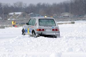 Bucky Weitnauer's VW Rabbit gets caught on the outside of a bank.