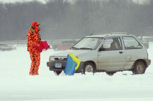 Bruce Retka works corners while Bucky Weitnauer's VW Rabbit gets towed from the bank.