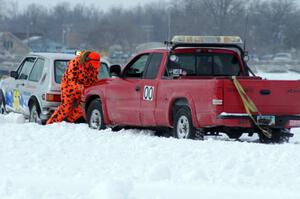 Jim Anderson's Dodge Ram Pickup tries to get the stranded Bucky Weitnauer VW Rabbit off the bank.