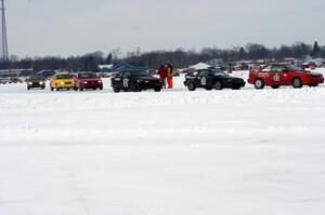 The field stops for a short red flag to remove two cars from the track