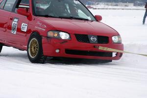 Pete Tavernier / Bruce Powell Nissan Sentra Spec V lost a wheel on the back part of the track