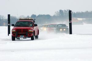 Jim Anderson's Dodge Ram Pickup pulls off the track before the field gets the green again