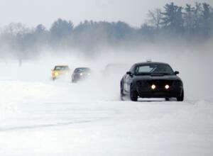 Chad Reinhofer / Cody Reinhofer Audi TT leads the field down the back stretch