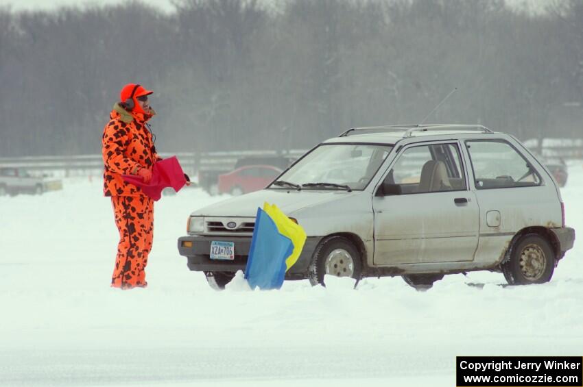 Bruce Retka works corners while Bucky Weitnauer's VW Rabbit gets towed from the bank.