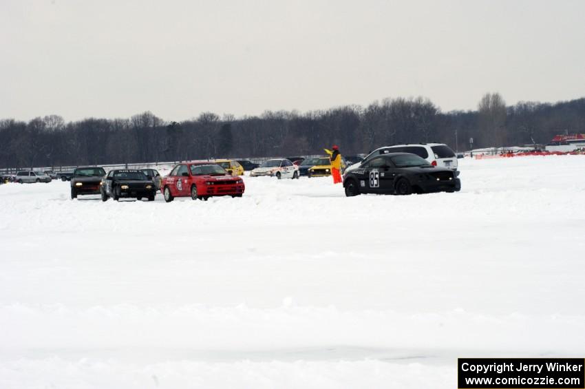 The field pulls away after a short red flag to remove two cars from the track