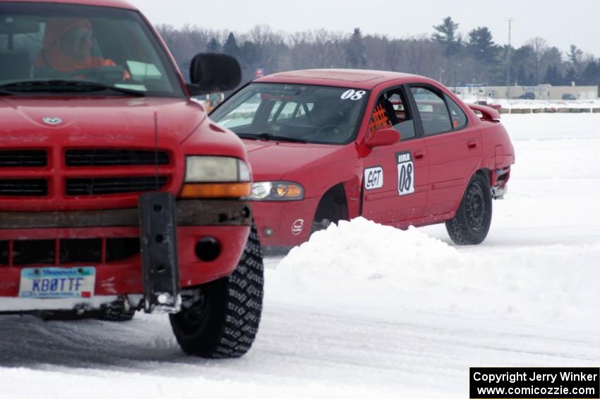 Pete Tavernier / Bruce Powell Nissan Sentra Spec V lost a wheel on the back part of the track